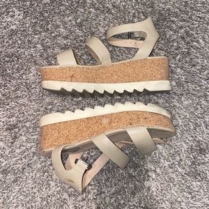 Steve Madden platform sandals.